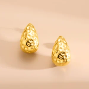 hammered gold earrings textured teardrop design
