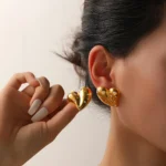 golden heart earrings studio photography