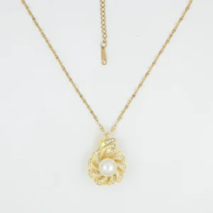 Gold Pearl Twirl Pendant Necklace with pearl and CZ stones closeup view