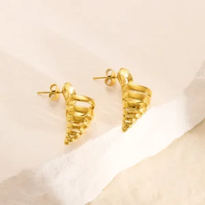22k spiral gold earrings flat lay photo
